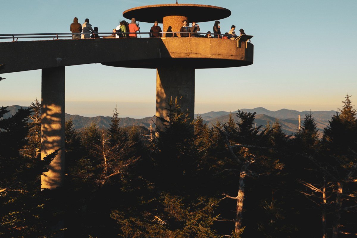Clingmans Dome observation tower rising above a sea of clouds at sunrise
