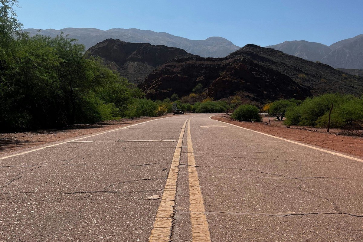 West Texas Chihuahuan Desert highway stretching toward distant mountain range