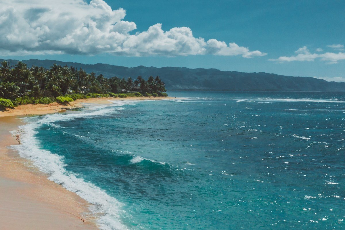 Waimanalo Beach Oahu empty white sand with Koolau mountains behind