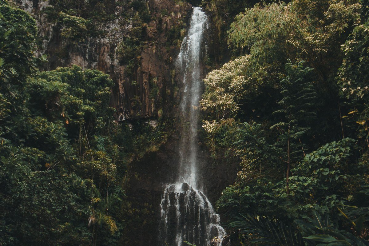 Wailua Maui Road to Hana waterfall pool surrounded by jungle
