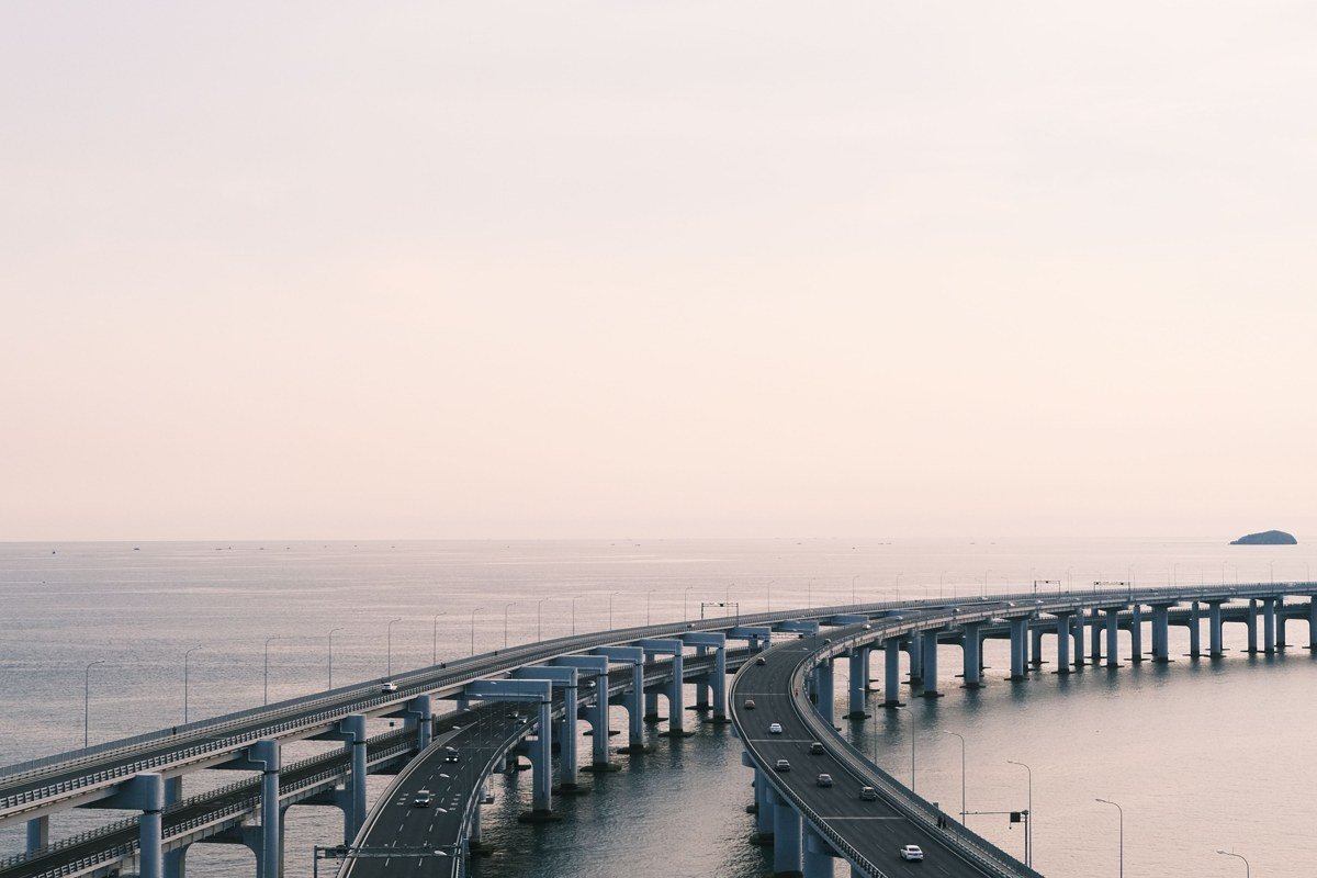 aerial view of the Overseas Highway bridge curving between turquoise Florida Keys islands
