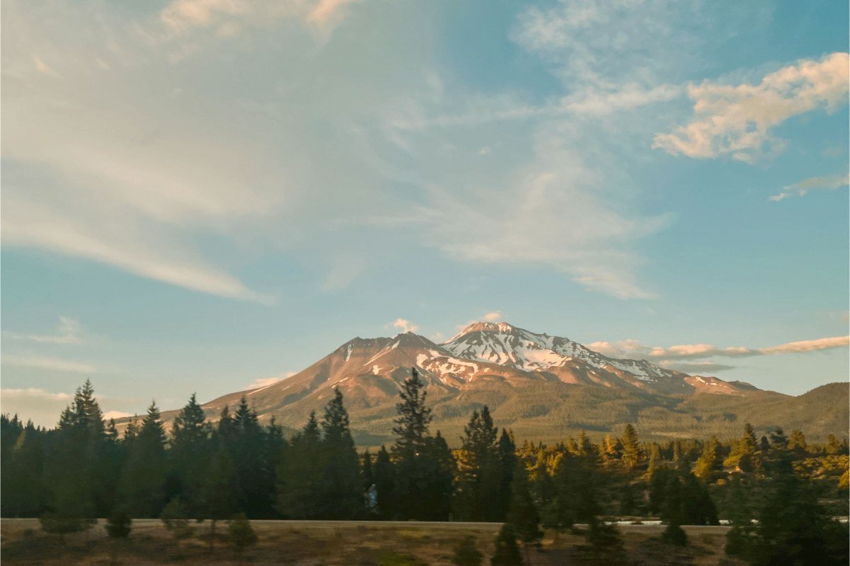 historic downtown Truckee California storefronts with snow-capped peaks behind