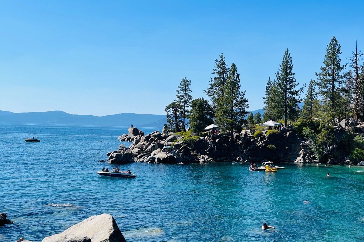 Sand Harbor Lake Tahoe turquoise cove with granite boulders and swimmers