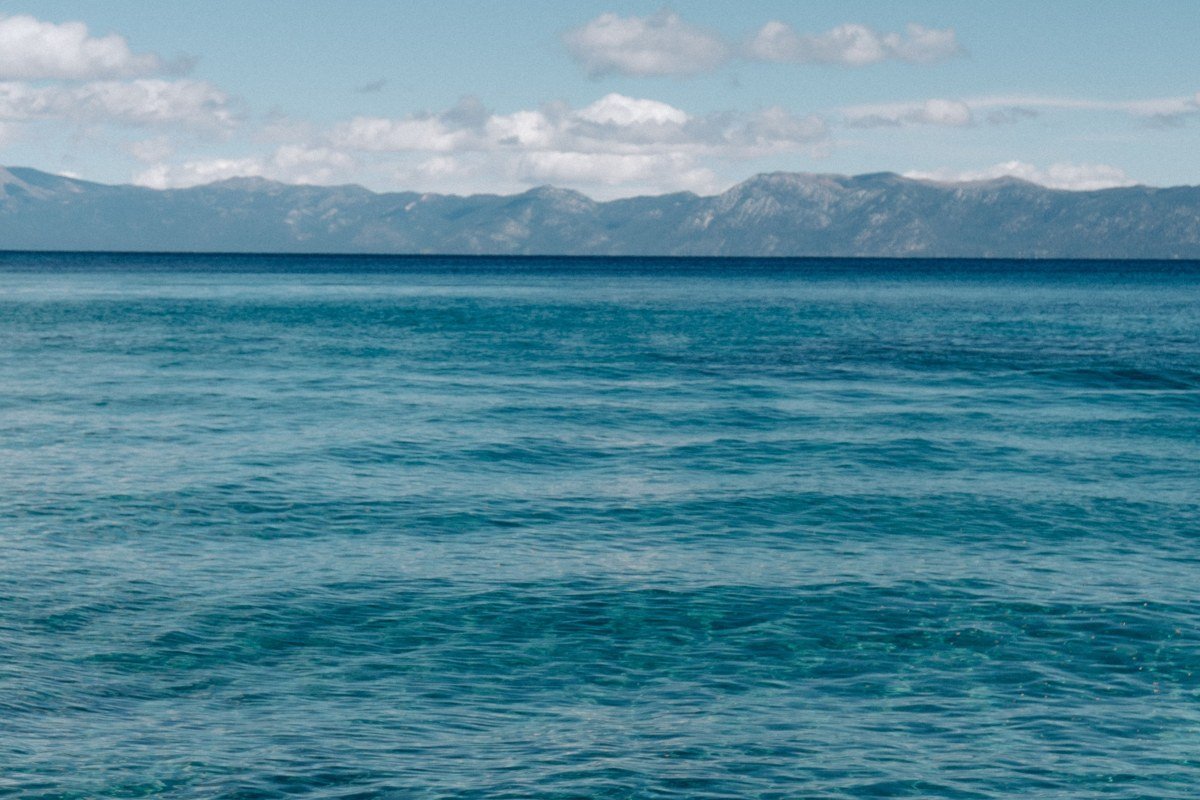 Secret Cove Lake Tahoe clothing-optional beach cove with boulders and turquoise water