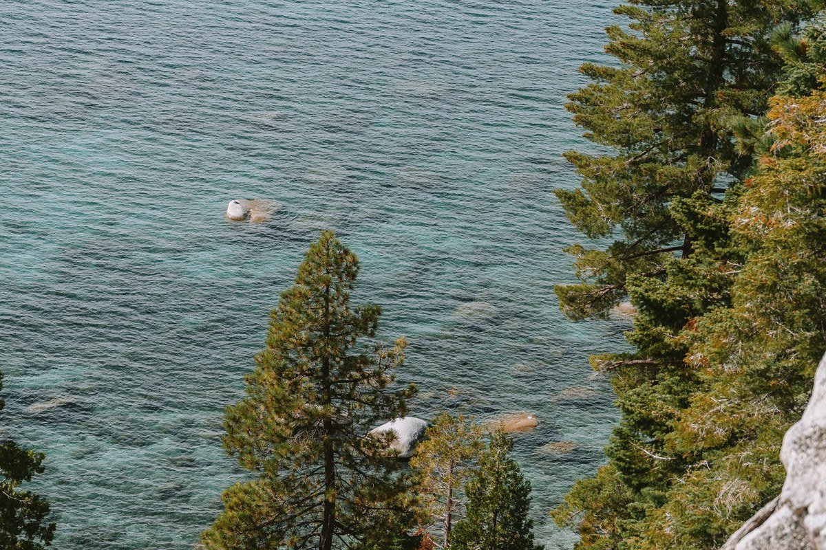 Zephyr Cove Beach Lake Tahoe wide sandy shoreline with paddlewheel boat and mountains