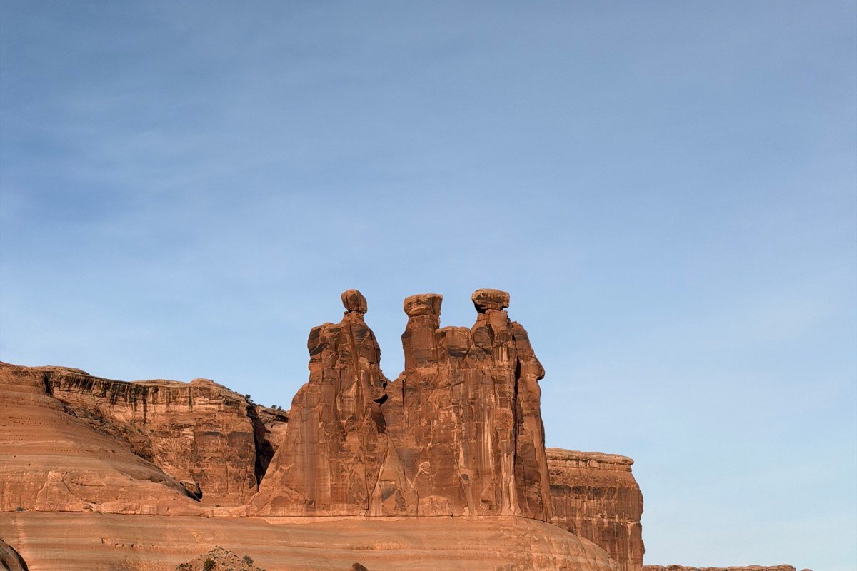 highline slackline rigged between Utah desert towers near Moab