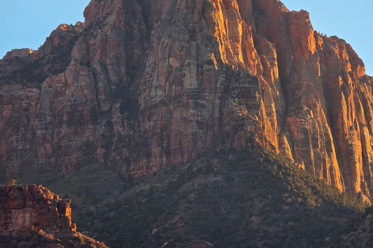 downtown Moab Utah Main Street fall evening with red rock backdrop