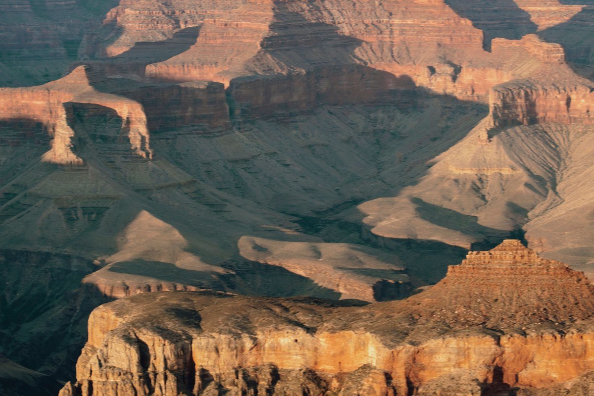 The wide red rock panorama from the Airport Mesa Vista roadside overlook at dawn