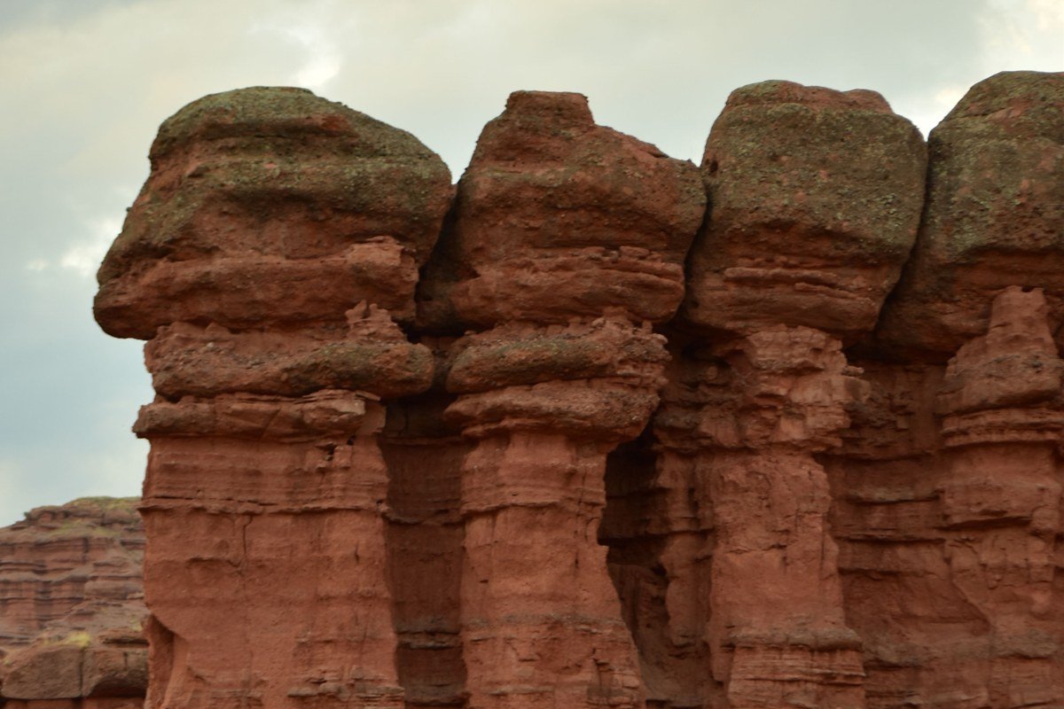 Layered red rock formations catching dawn light from the Schnebly Hill Road overlook