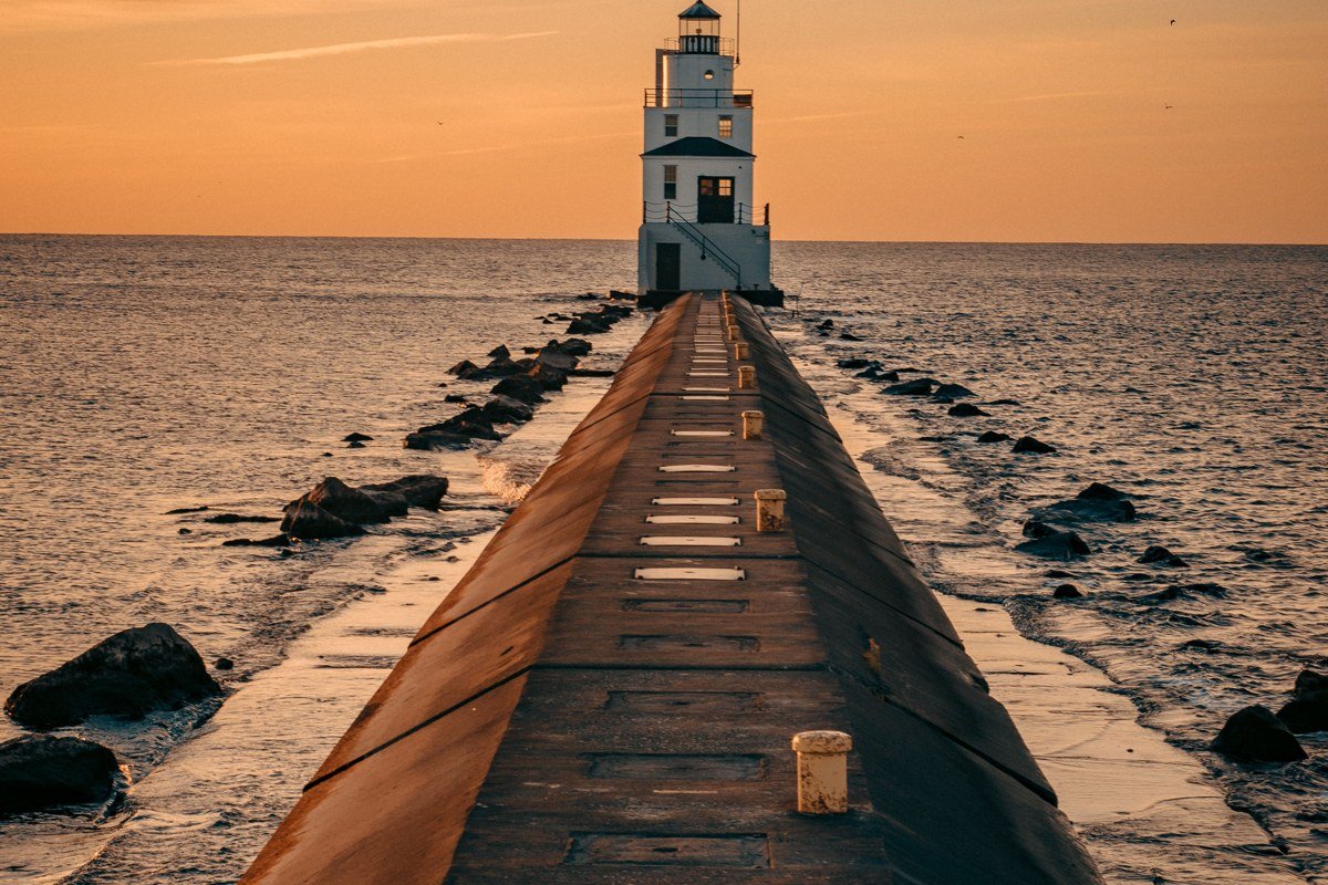 Big Bay Michigan lighthouse road disappearing into lake mist